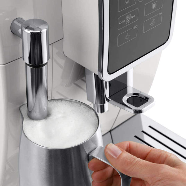 Up Close View of DeLonghi Dinamica Espresso Machine Frothing Milk