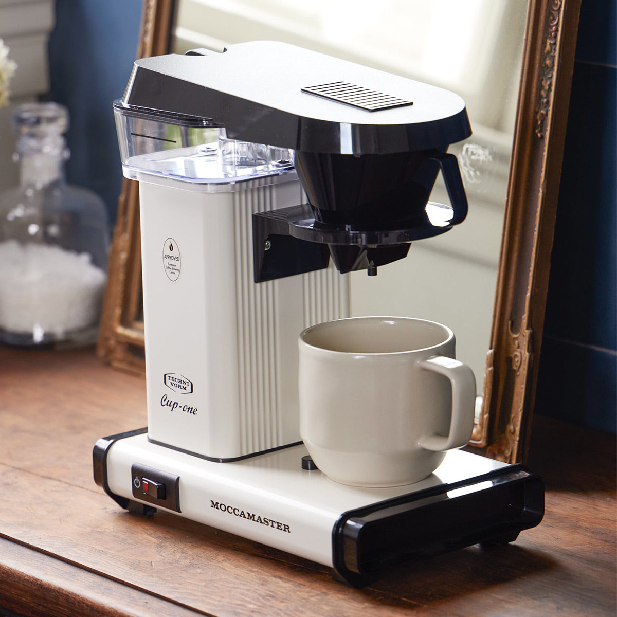 https://ecscoffee.com/cdn/shop/products/moccamaster-cup-one-brewer-off-white-69211-4.jpg?v=1653655910